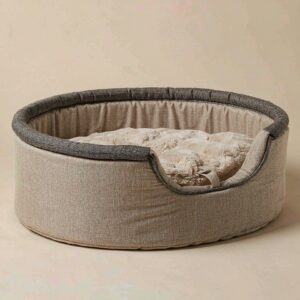 Beige cotton-linen round pet bed with a plush cushion